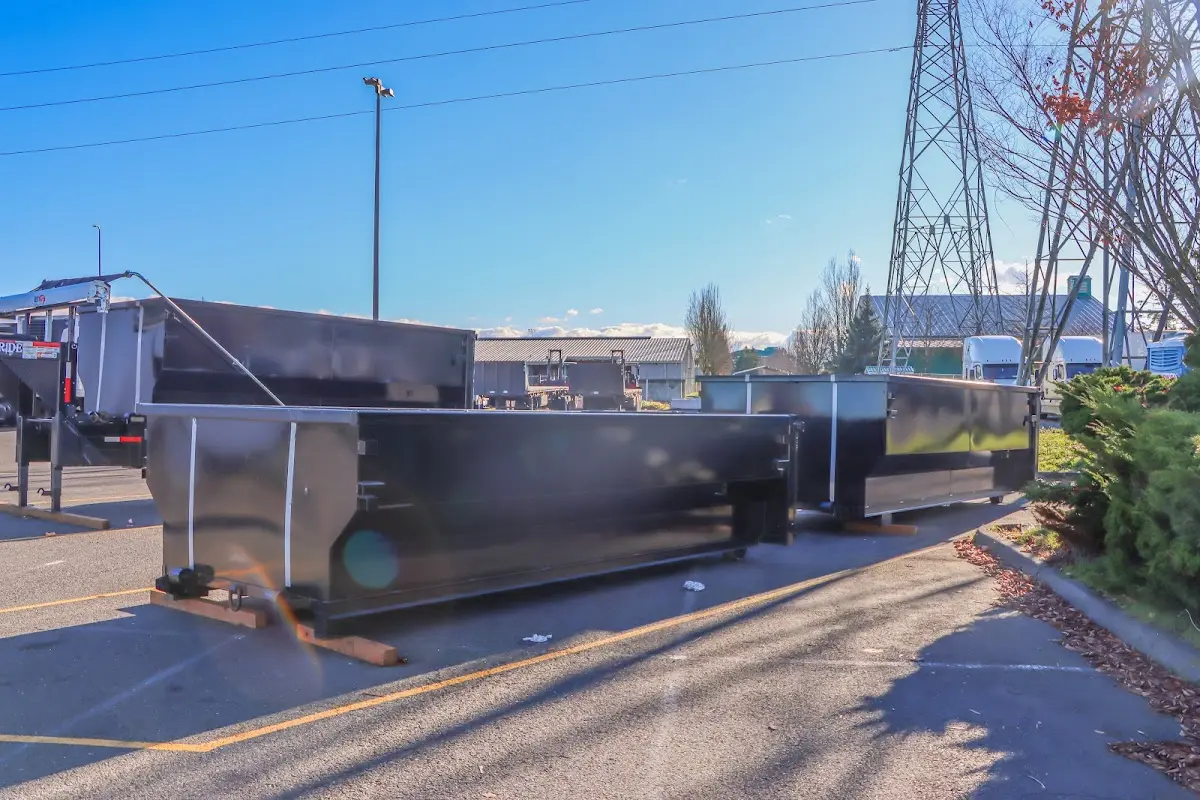 Roll-off dumpster ready for waste disposal at job site for Construction Dumpster Rental in Rathdrum